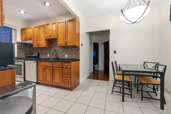 a view of a livingroom with furniture and window