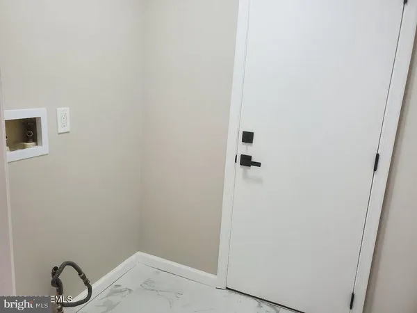 a bathroom with a sink and vanity