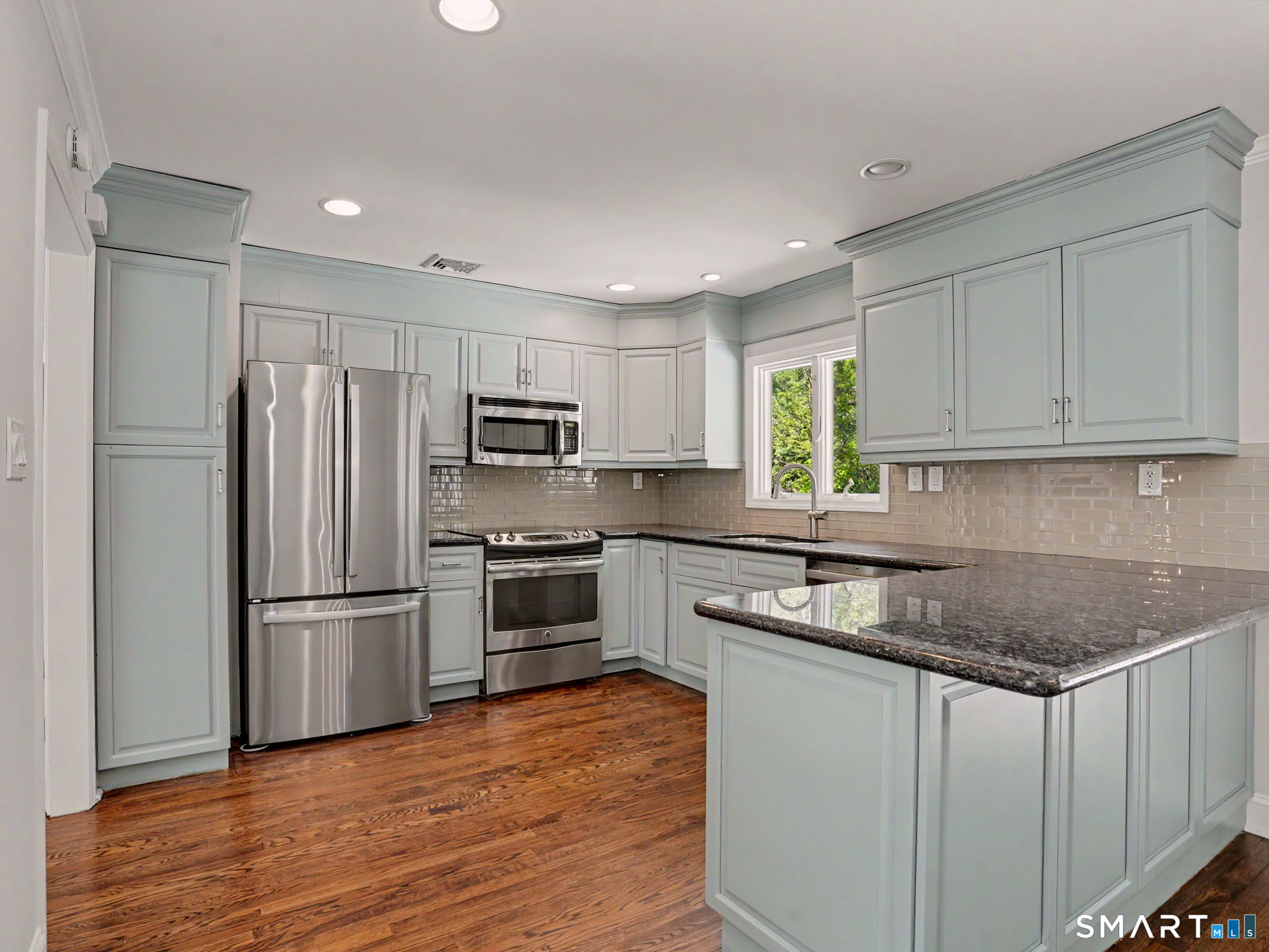 44 Sniffen Road Westport, CT 06880 - Photo 14 of 39 The convenience of the open concept kitchen and dining room