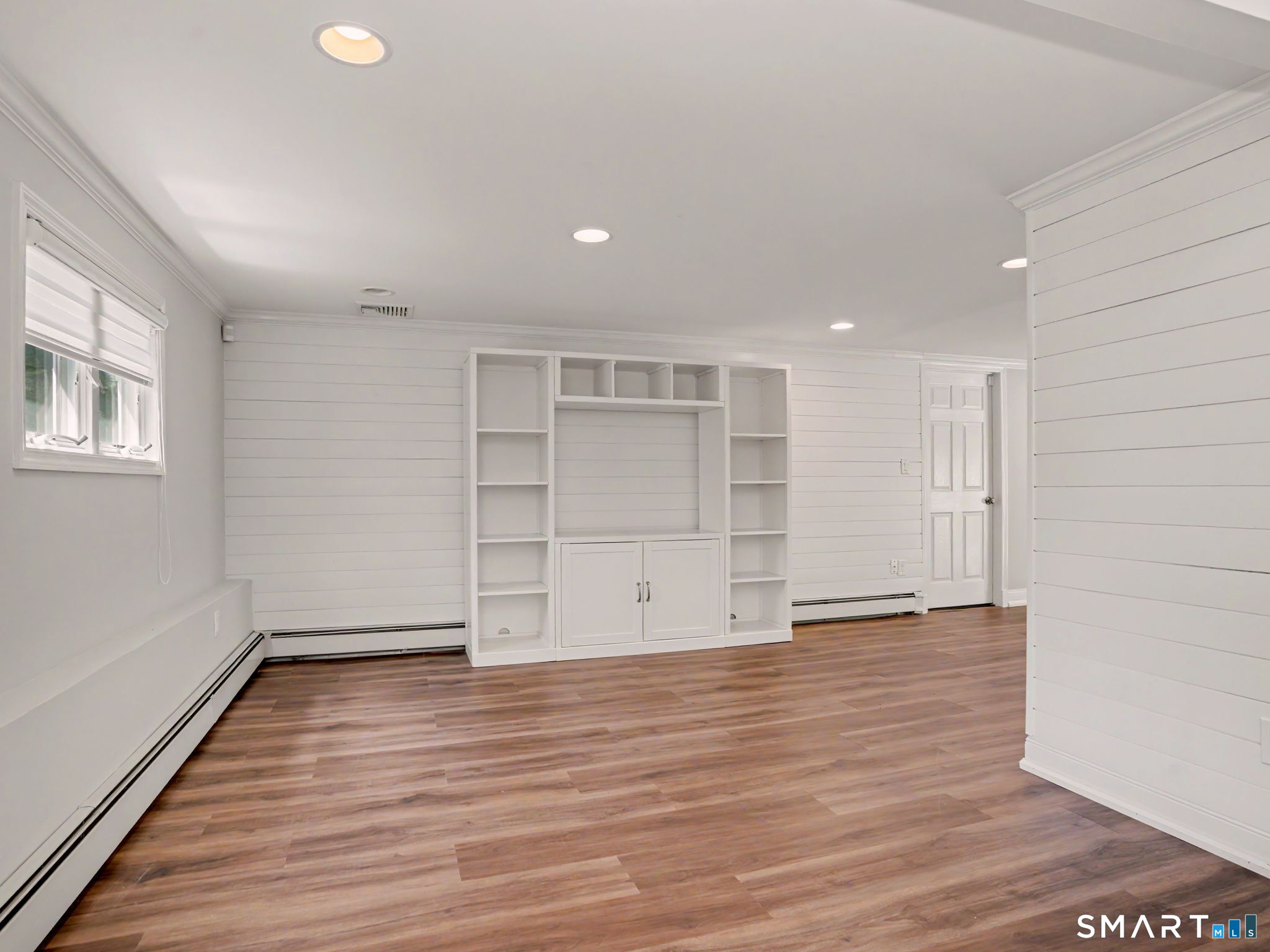 44 Sniffen Road Westport, CT 06880 - Photo 18 of 39 Family room with media cabinet