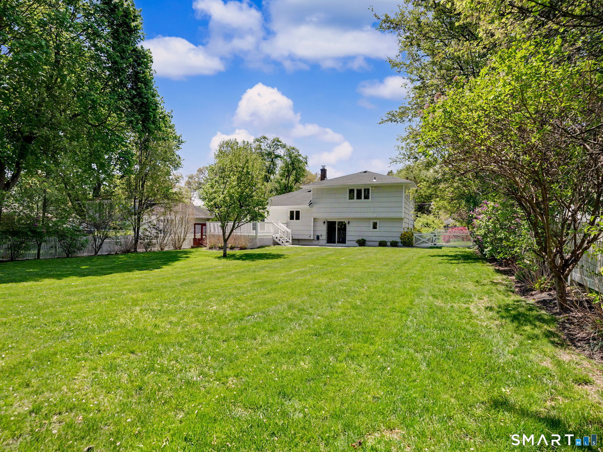 44 Sniffen Road Westport, CT 06880 - Photo 36 of 39 Wow, what a great backyard for play, chilling and entertaining.