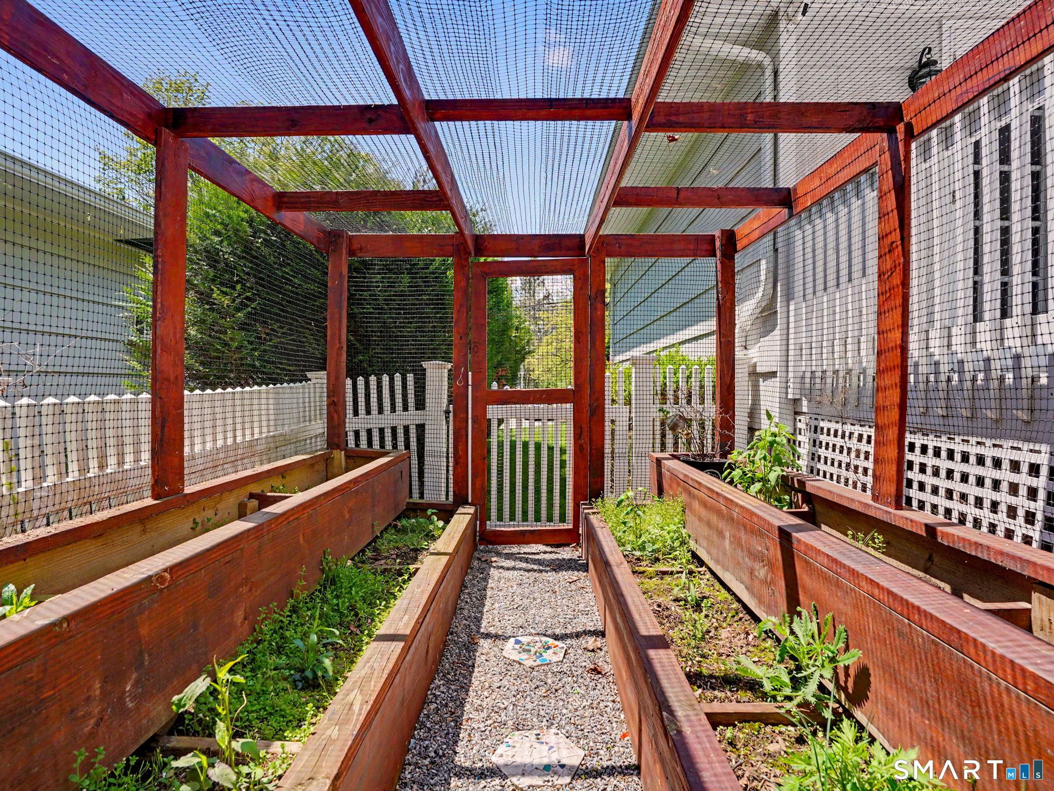 44 Sniffen Road Westport, CT 06880 - Photo 37 of 39 For the garden enthusiast a completely enclosed deer proof garden with raised beds.