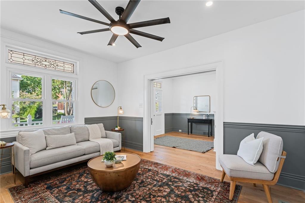40 Walnut Street Crafton, PA 15205 - Photo 11 of 50 a living room with furniture a rug and a window