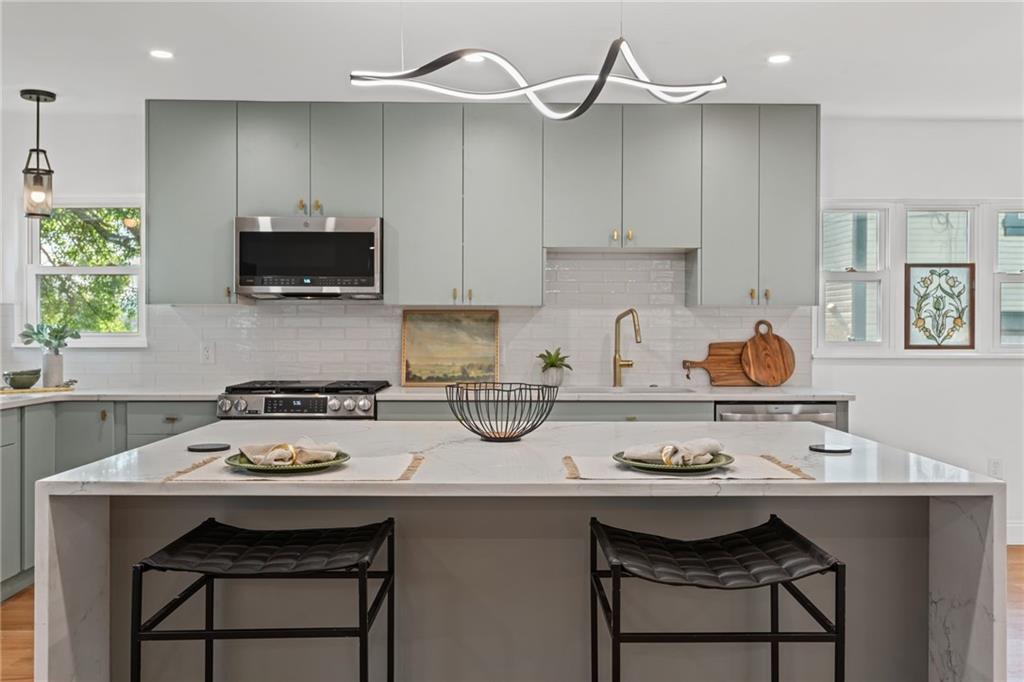 40 Walnut Street Crafton, PA 15205 - Photo 18 of 50 a kitchen with a sink cabinets and appliances