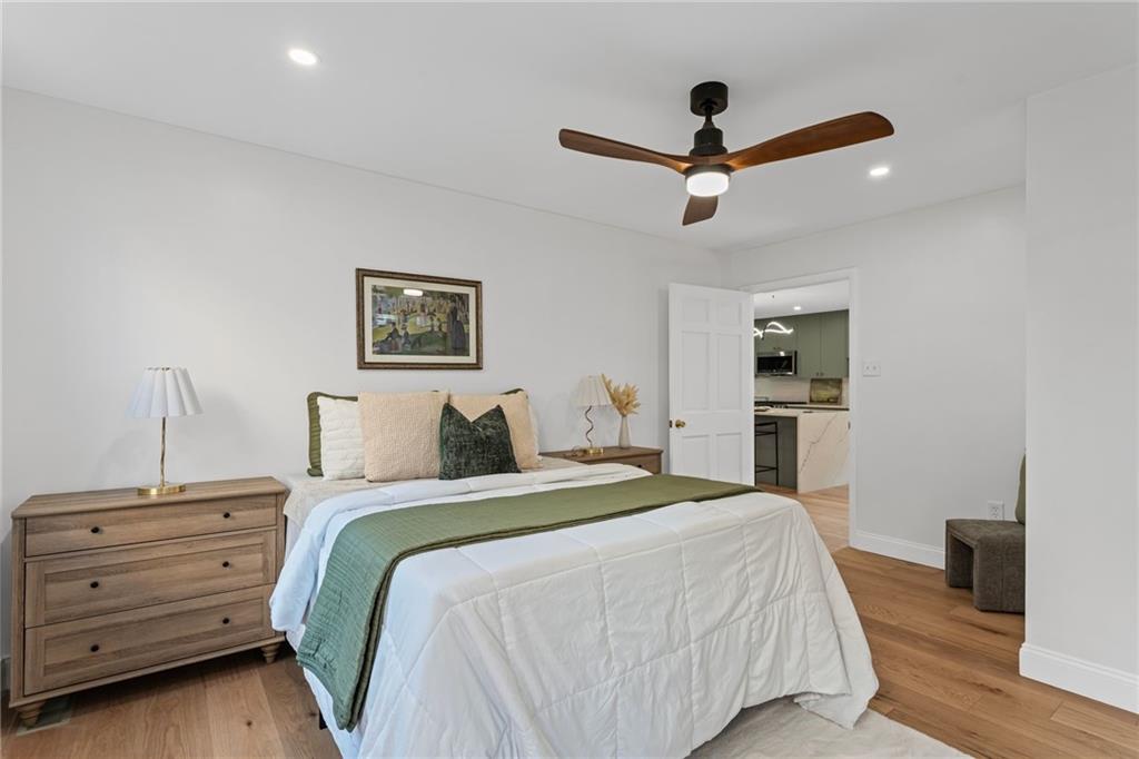40 Walnut Street Crafton, PA 15205 - Photo 27 of 50 a bedroom with a bed and a ceiling fan