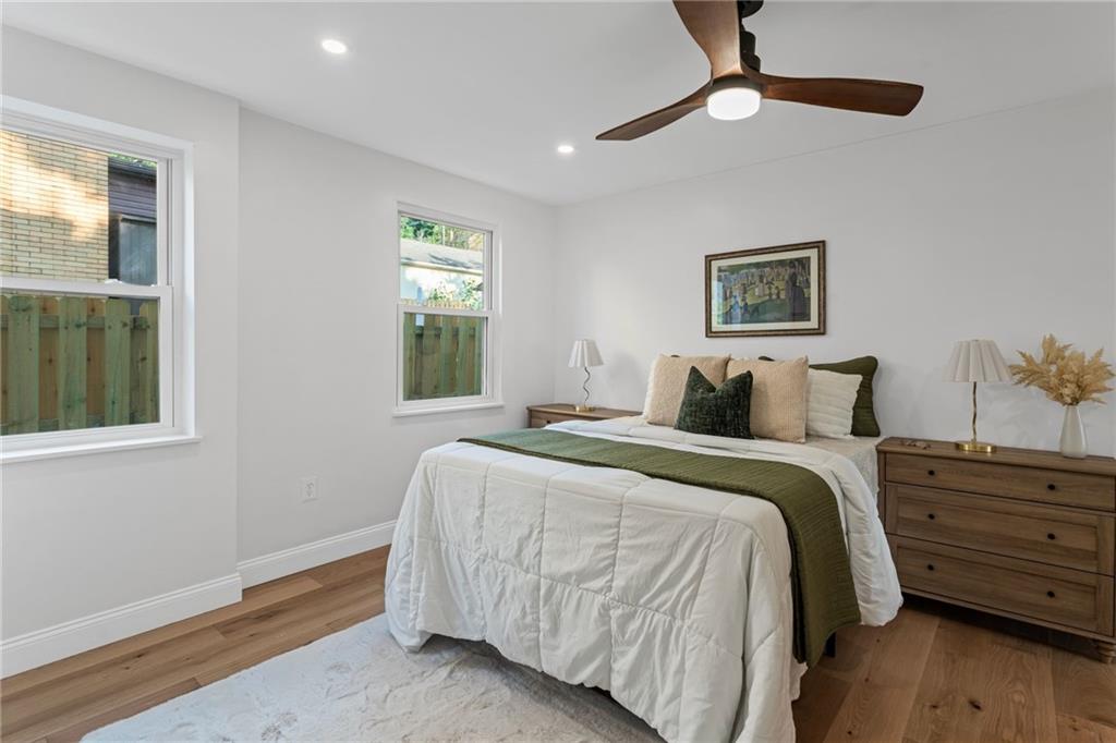 40 Walnut Street Crafton, PA 15205 - Photo 28 of 50 a bedroom with bed and wooden floor