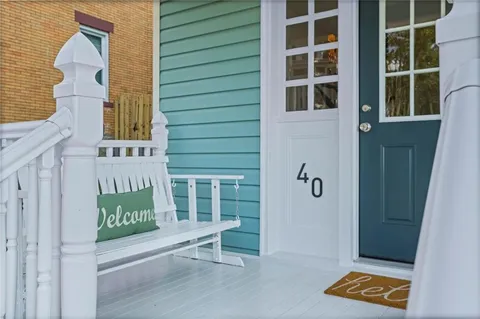 a view of a bench in front of a building