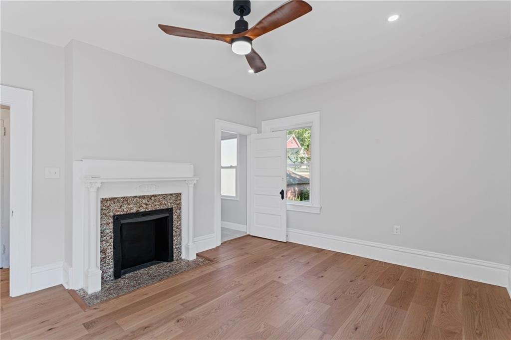 40 Walnut Street Crafton, PA 15205 - Photo 31 of 50 an empty room with windows and fireplace
