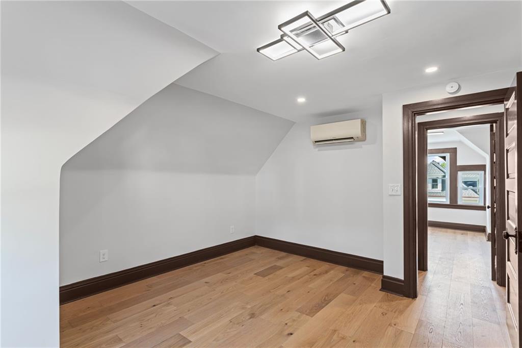 40 Walnut Street Crafton, PA 15205 - Photo 42 of 50 a view of empty room with wooden floor