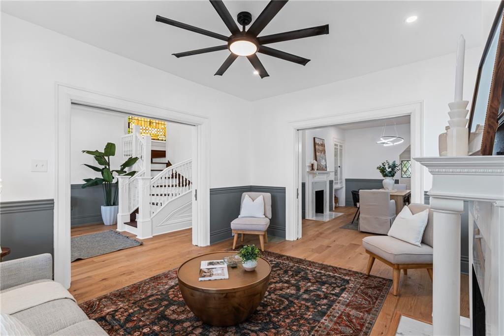 40 Walnut Street Crafton, PA 15205 - Photo 9 of 50 a living room with furniture a fireplace and a chandelier