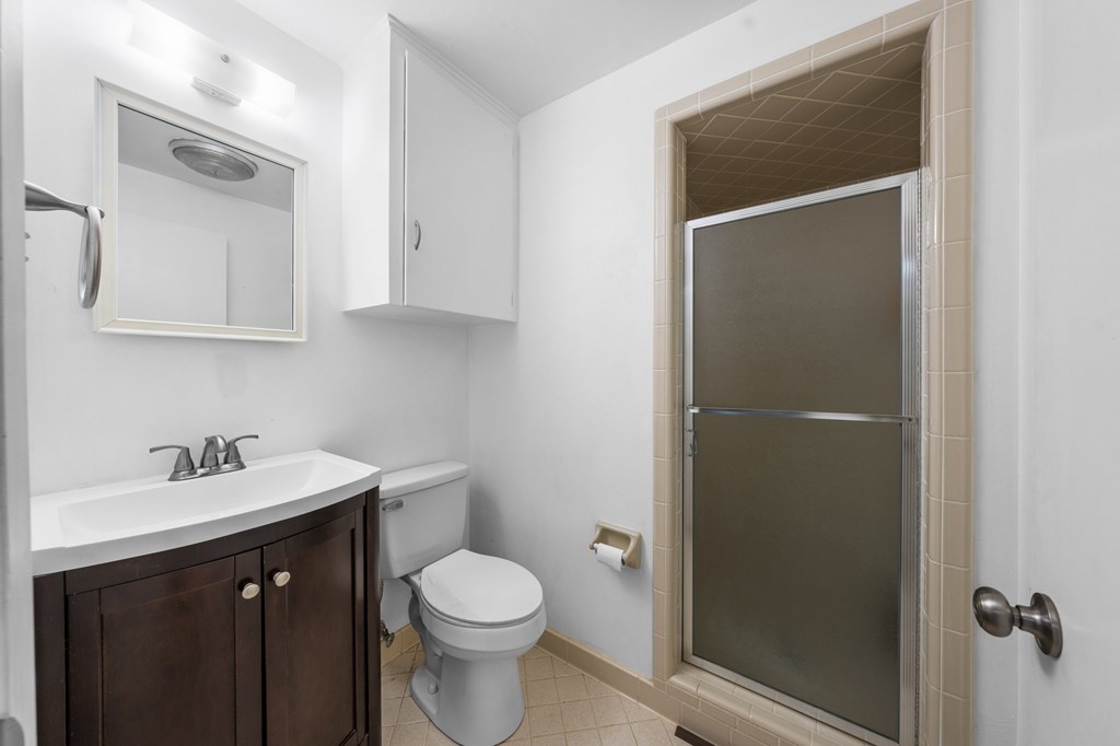 711 Cardinal Drive Kerrville, TX 78028 - Photo 21 of 30 a bathroom with a sink toilet and vanity