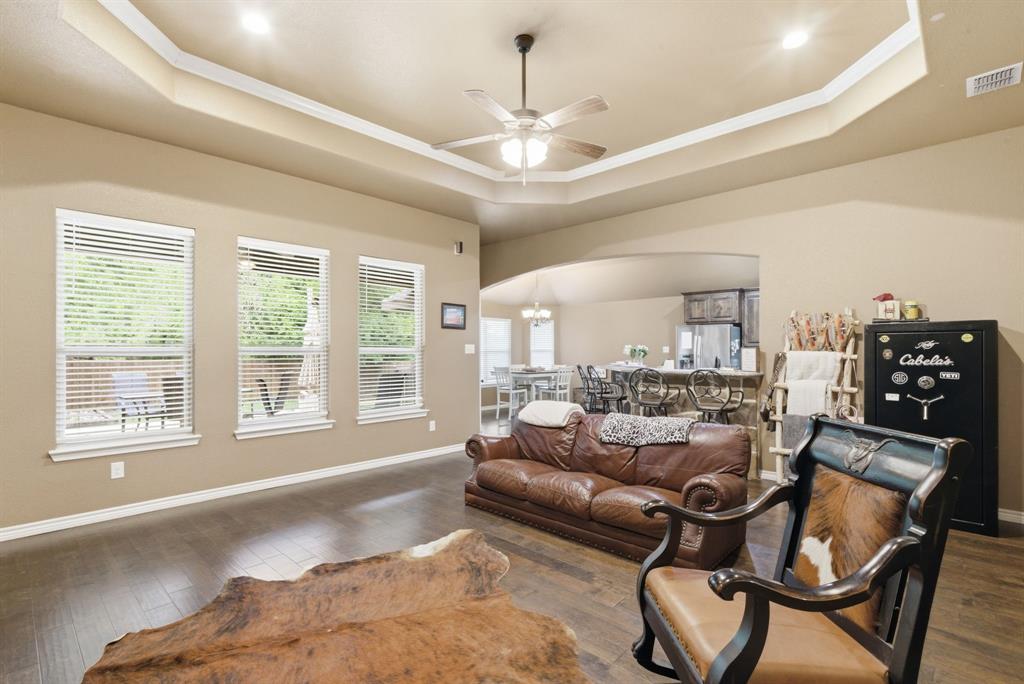 940 Elk Ridge Drive Stephenville, TX 76401 - Photo 3 of 23 a living room with furniture and a large window