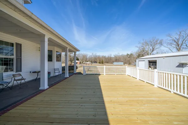 a kitchen with stainless steel appliances granite countertop a stove sink and cabinets