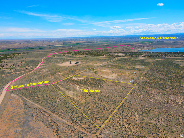 4500 South 22750th Duchesne, UT 84021 - Photo 2 of 34 7.50-acre parcel featuring an arid landscape with distant water body and open terrain