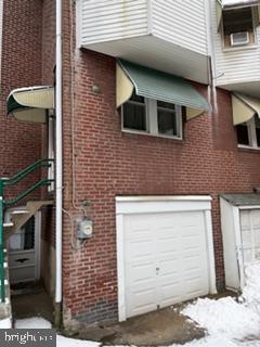 4640 Adams Avenue Philadelphia, PA 19124 - Photo 33 of 34 a view of a brick house with large windows