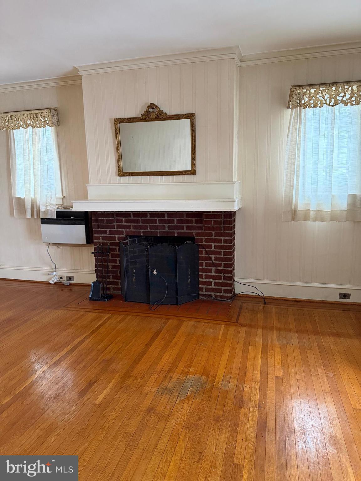 4640 Adams Avenue Philadelphia, PA 19124 - Photo 10 of 34 a view of empty room with wooden floor and fan