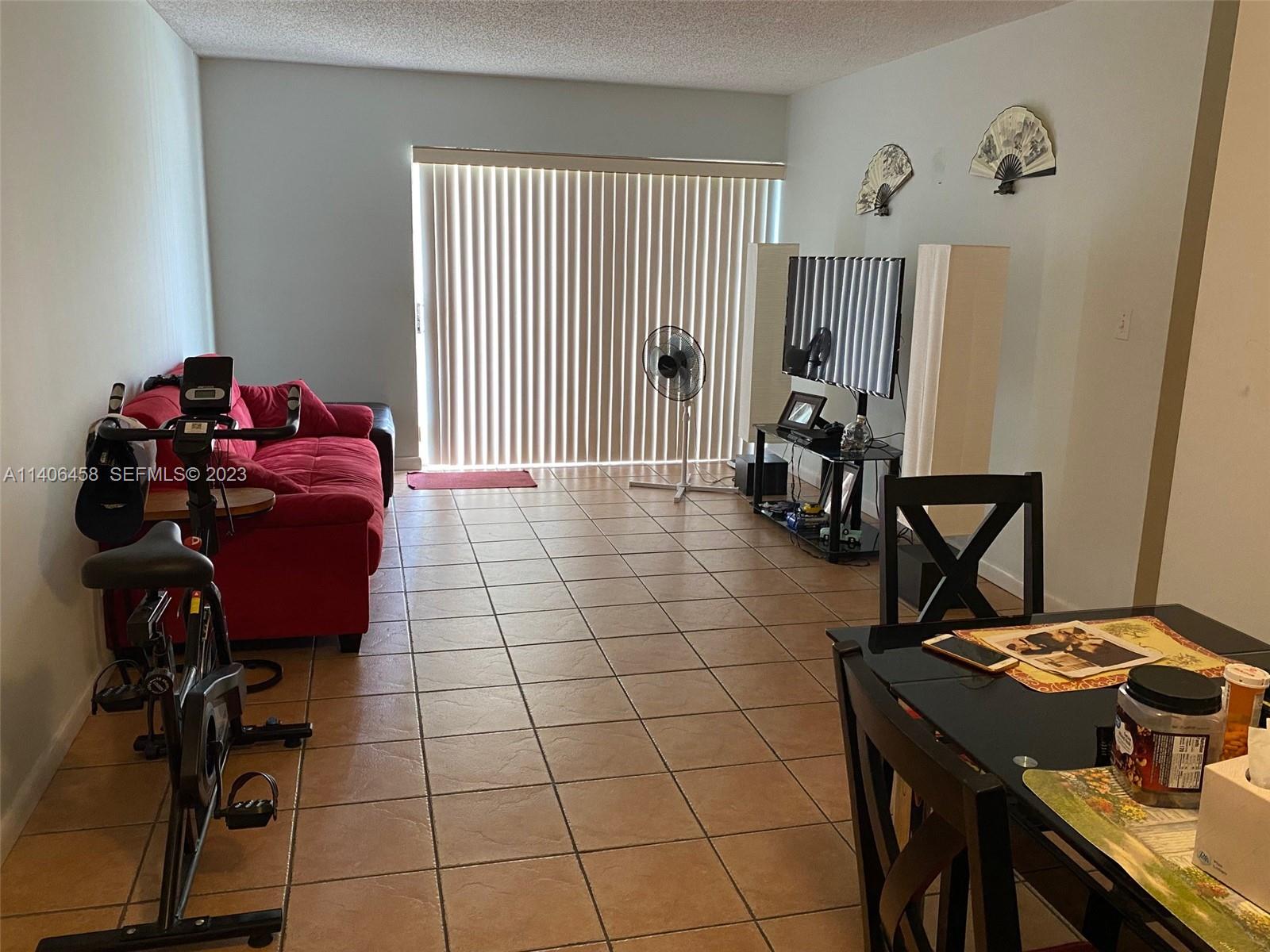9227 Southwest 87th Avenue, Unit B7 Miami, FL 33176 - Photo 2 of 21 a view of a workspace with furniture