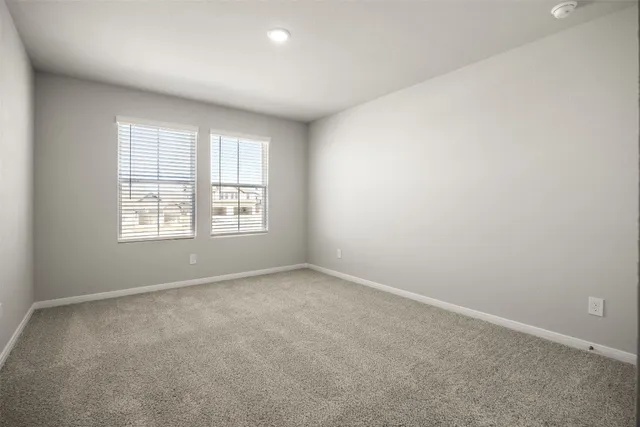 a bathroom with a granite countertop sink mirror and double
