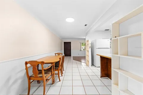 a view of a livingroom with furniture and a fireplace