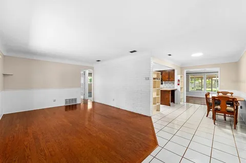a view of kitchen with furniture and window