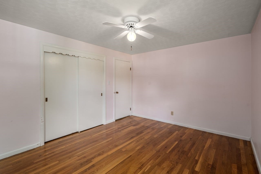 11 Gloucester Road Grafton, MA 01536 - Photo 15 of 38 a view of a room with wooden floor