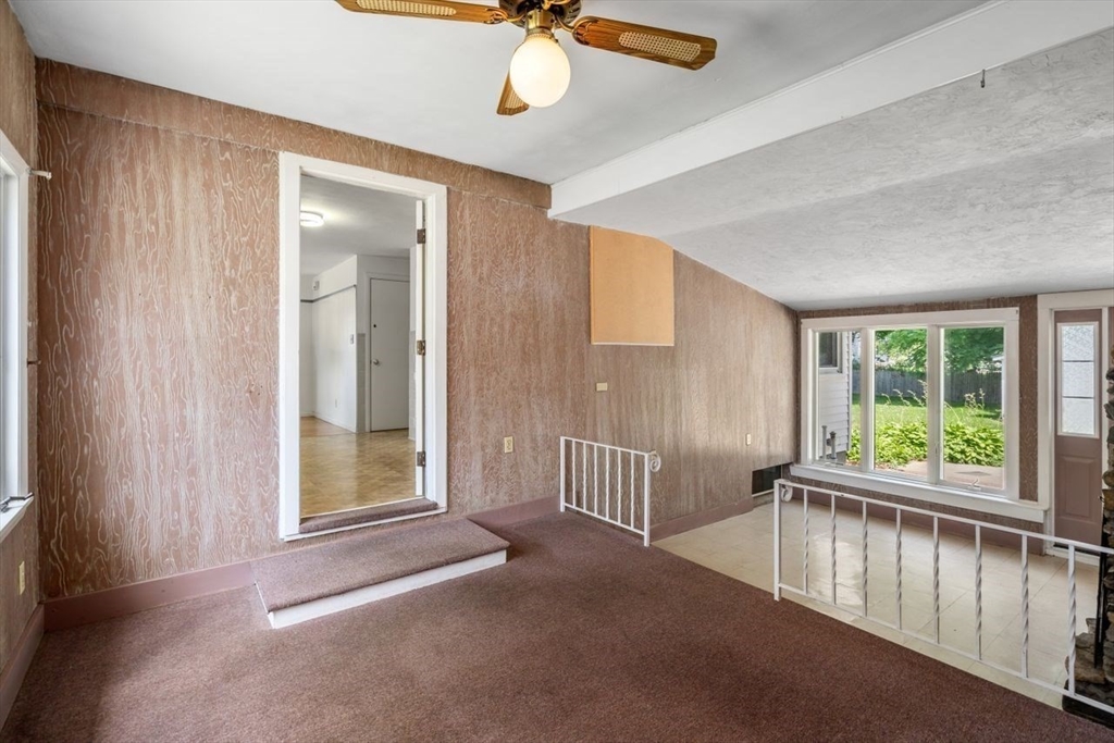 11 Gloucester Road Grafton, MA 01536 - Photo 4 of 38 a view of an empty room with a window