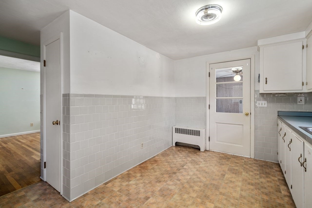 11 Gloucester Road Grafton, MA 01536 - Photo 8 of 38 a view of a kitchen with cabinets