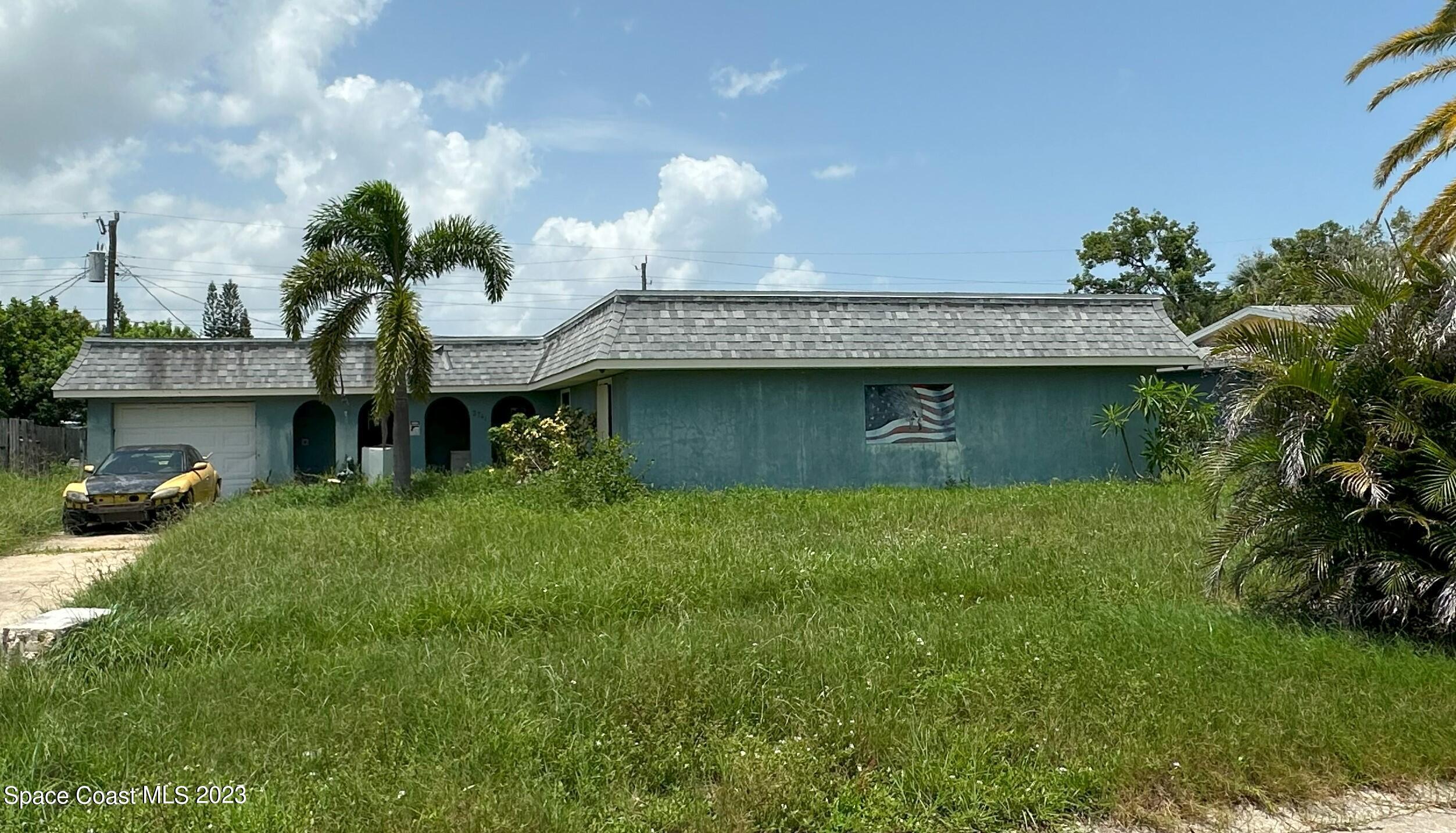 2741 Rhapsody Street Northeast Palm Bay, FL 32905 - Photo 1 of 15 Front