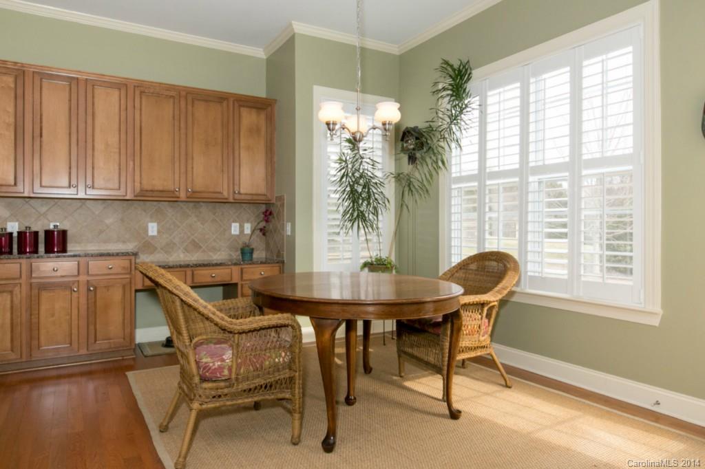 336 Miners Cove Way Fort Mill, SC 29708 - Photo 14 of 21 a view of a dining room with furniture and a window