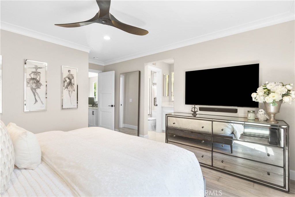 78 Bower Tree Irvine, CA 92603 - Photo 20 of 25 a bedroom with furniture and flat screen tv