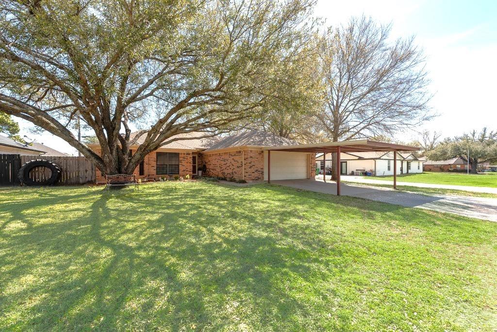 579 South Hitt Street Boyd, TX 76023 - Photo 5 of 34 Beautifully well maintained home! NEW HVAC and GUTTERS! Huge and strongly constructed carport as well as 2 car garage.