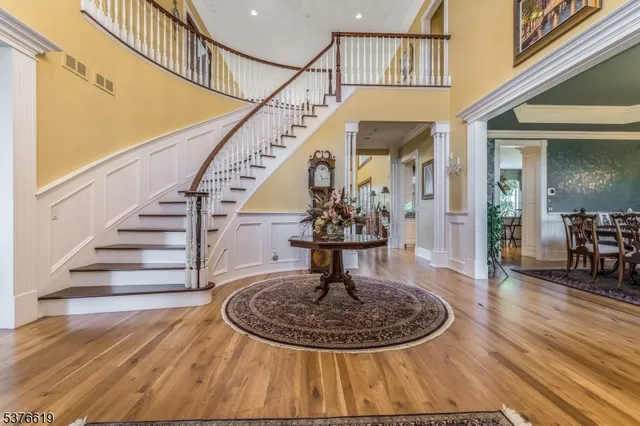 a living room with furniture fireplace and flat screen tv