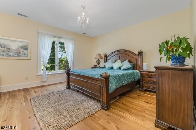 a room with a bed and a window