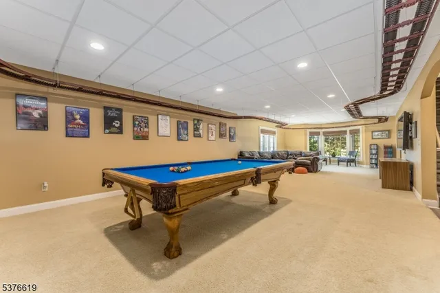 a bathroom with a toilet a sink and a window
