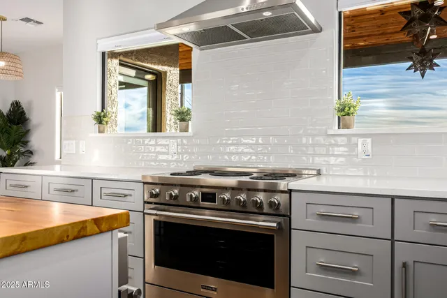 a view of a city with lush green forest