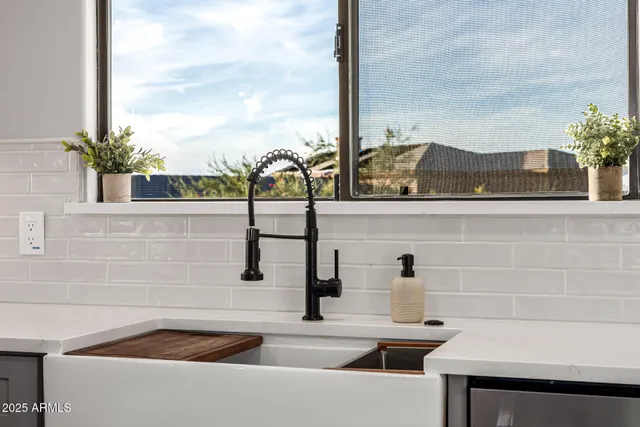 a view of a road with a bench in front of it