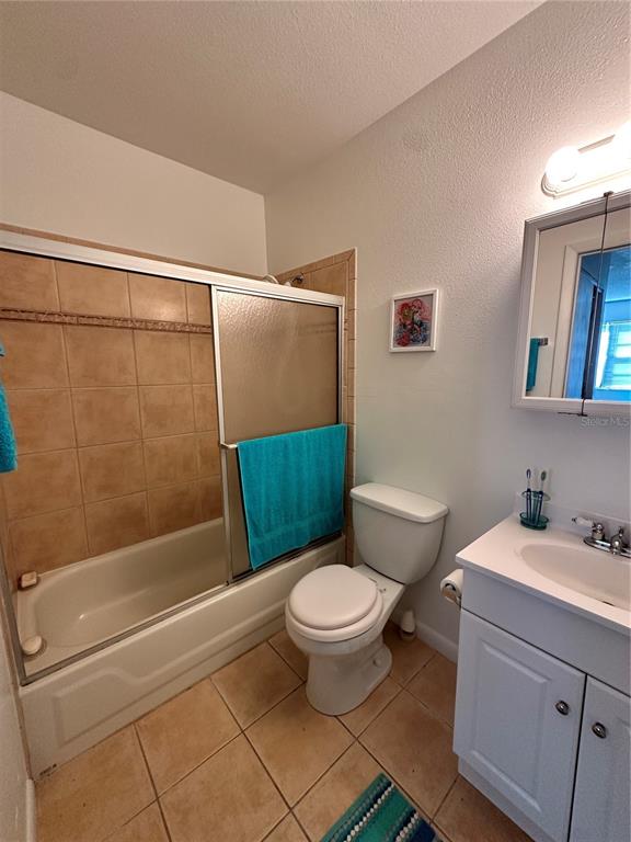 220 South 26th Street, Unit 3 Flagler Beach, FL 32136 - Photo 15 of 20 a bathroom with a sink a toilet and shower