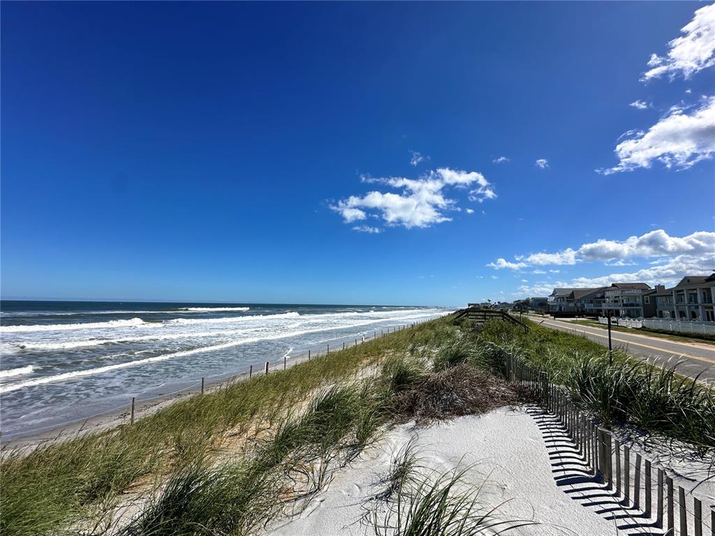 220 South 26th Street, Unit 3 Flagler Beach, FL 32136 - Photo 19 of 20 a view of a lake with a yard