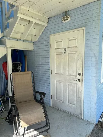 a view of livingroom with furniture and closet