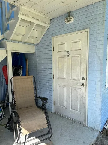 a view of livingroom with furniture and closet