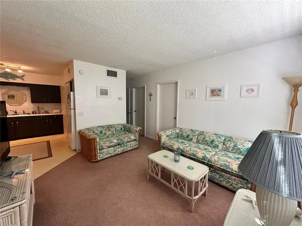 a bedroom with furniture and a couch