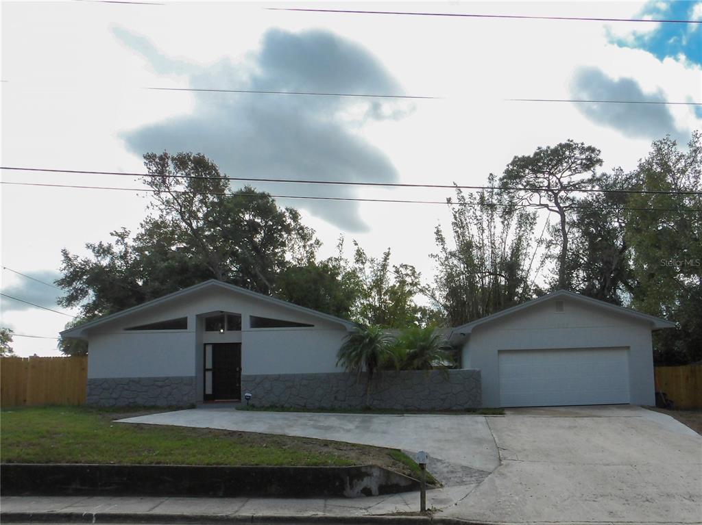 1805 North Street Altamonte Springs, FL 32701 - Photo 1 of 1 a front view of a house with a yard and garage