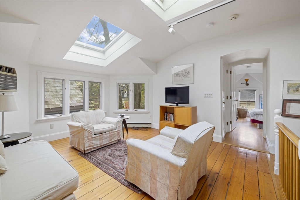 14 Linnaean Street Cambridge, MA 02138 - Photo 12 of 13 a living room with furniture or couch and a table