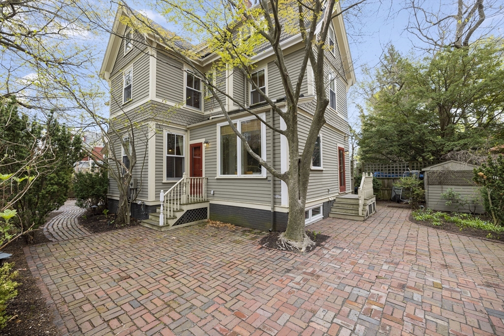 14 Linnaean Street Cambridge, MA 02138 - Photo 13 of 13 a view of a house with a yard