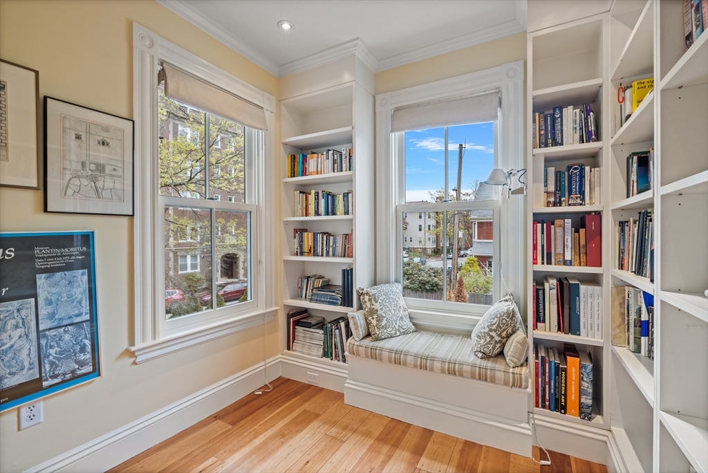 14 Linnaean Street Cambridge, MA 02138 - Photo 10 of 13 a living room with furniture and a book shelf