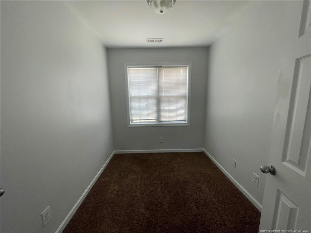2239 Gray Goose Loop Fayetteville, NC 28306 - Photo 11 of 26 an empty room with a window