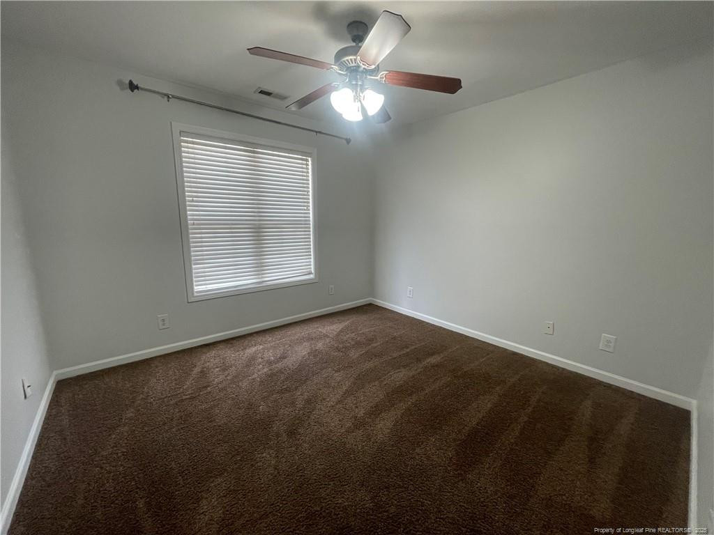 2239 Gray Goose Loop Fayetteville, NC 28306 - Photo 15 of 26 a view of an empty room with a window