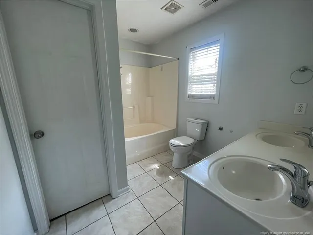 a bathroom with a sink and a tub