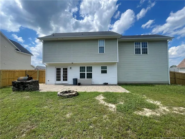 a house view with a garden space