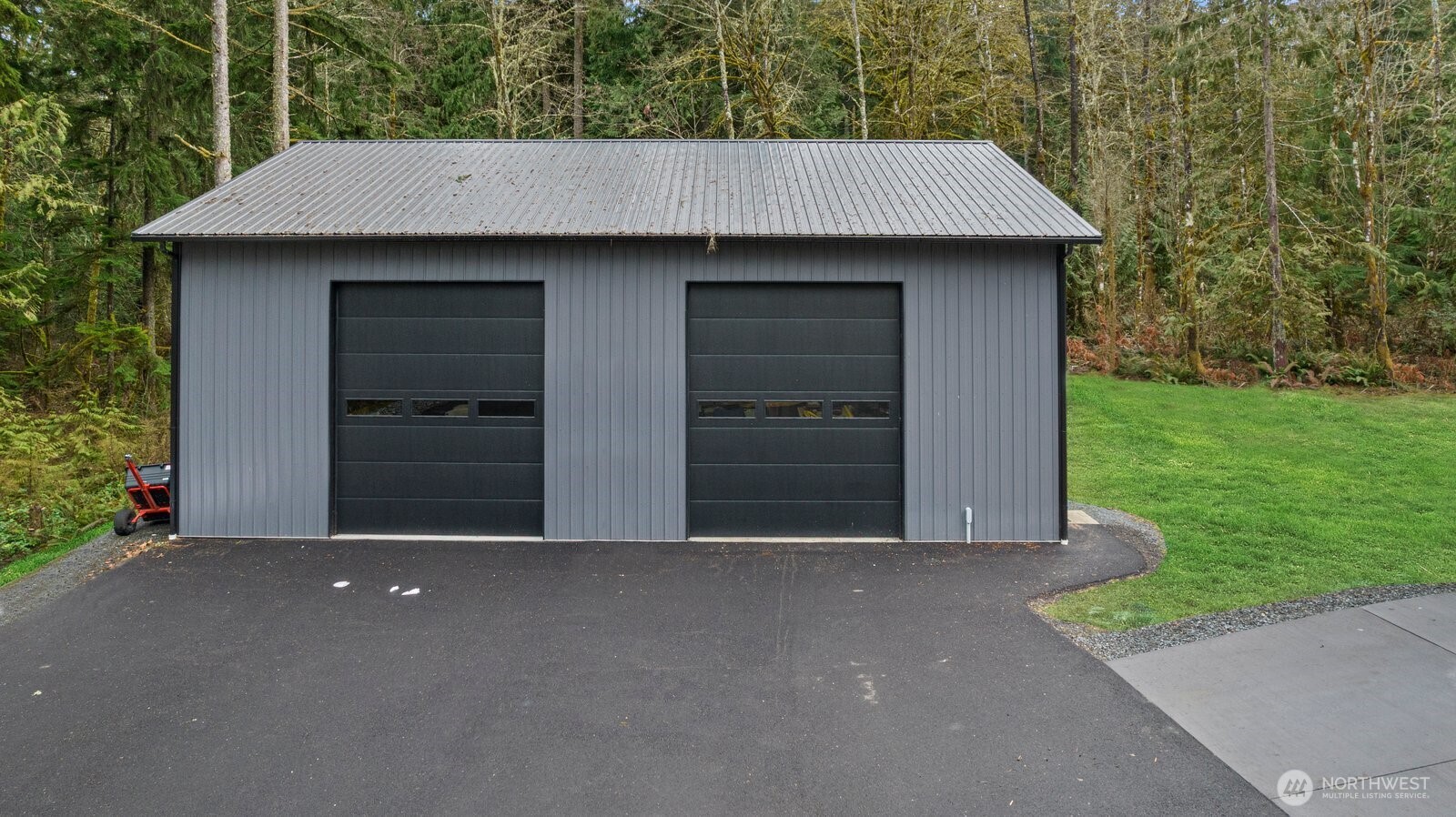 29657 Northeast 52nd Street Carnation, WA 98014 - Photo 39 of 40 a front view of a house with a garden